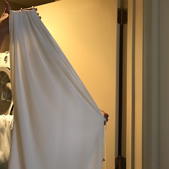 White off the shoulder dress.