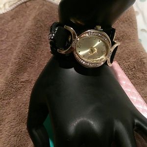 Rhinestones bracelet quartz watch.