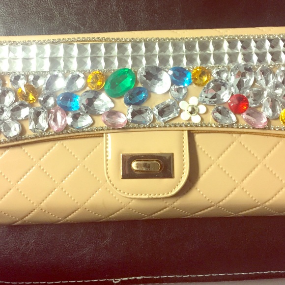 Tan studded clutch