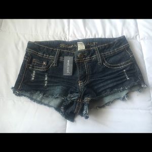 Distressed denim shorts