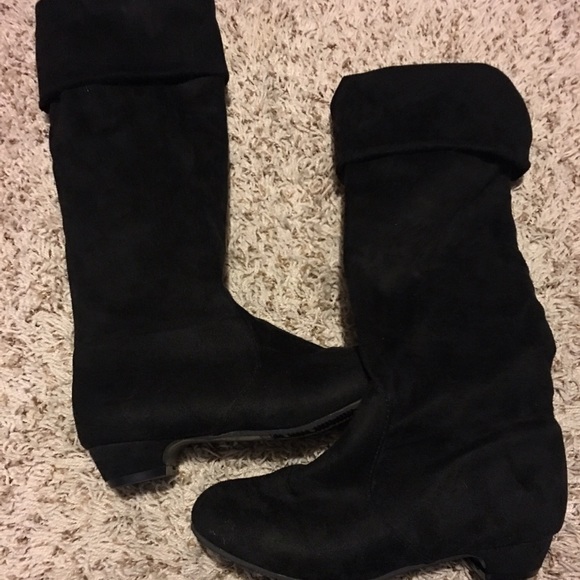 Tall black boots
