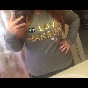 Bow & Drape custom-made sweater