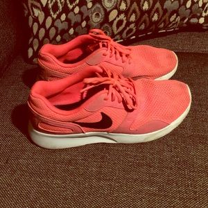 Nike tennis shoes.
