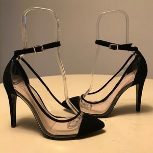 black transparent pumps