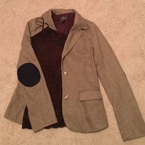 Brown blazer.