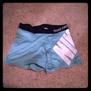 Nike Pros light blue
