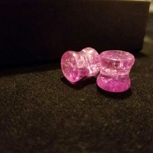 Flared purple plugs