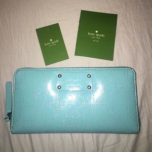 Kate Spade zip around patent leather wallet