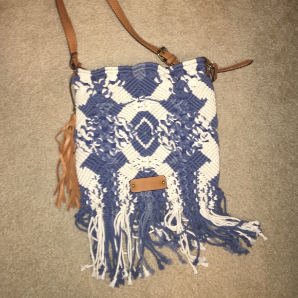 Braided white and blue cross body bag with tassels