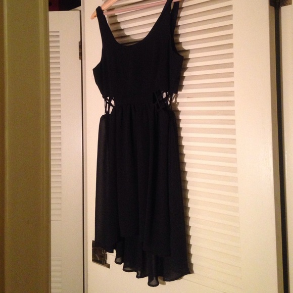 Lush dress with side criss cross cutout.