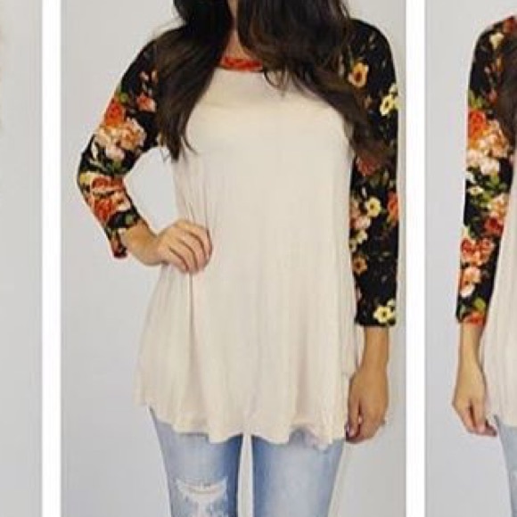Baseball tee, floral print arms.