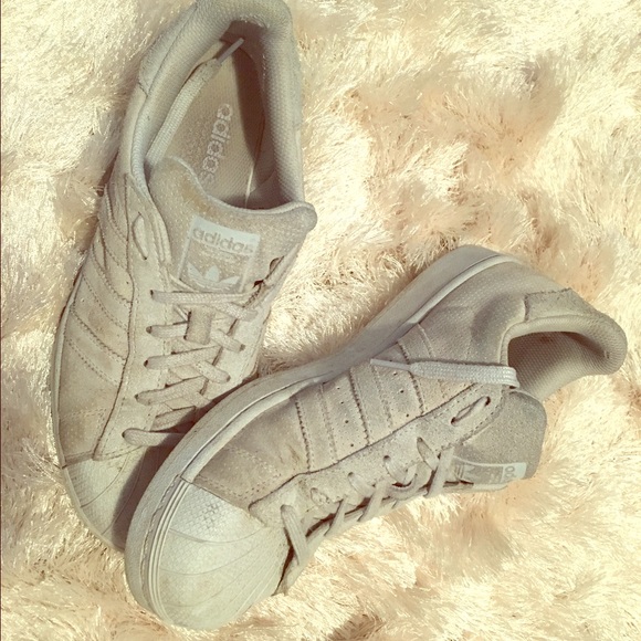 Light blue Adidas Superstars!