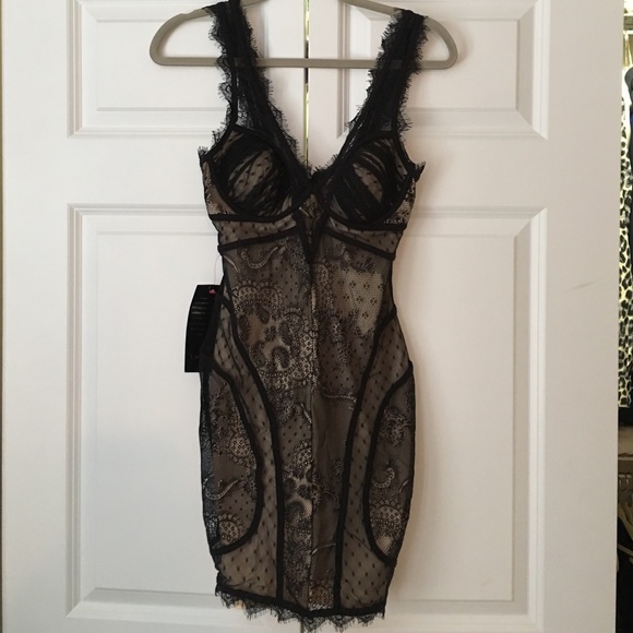 Bebe lace dress. Never worn with tags