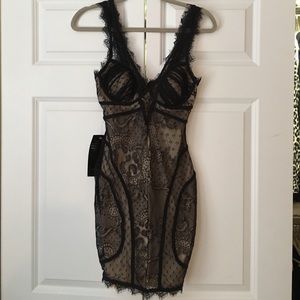 Bebe lace dress. Never worn with tags