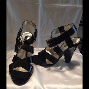 Dolce & Gabbana black patent leather sandals.