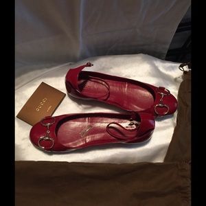 Red patent Gucci flats