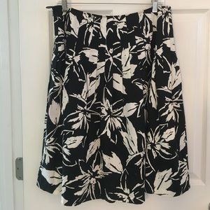 Black and white floral pleated skirt.