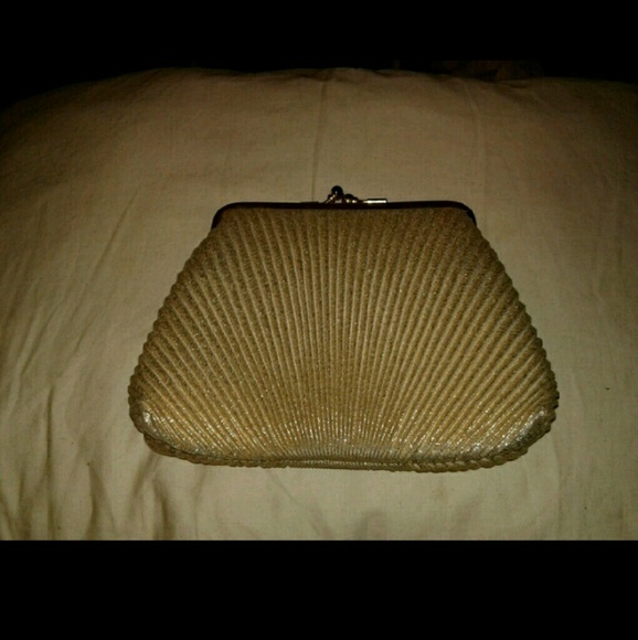 Gold sparkly shell shaped handbag