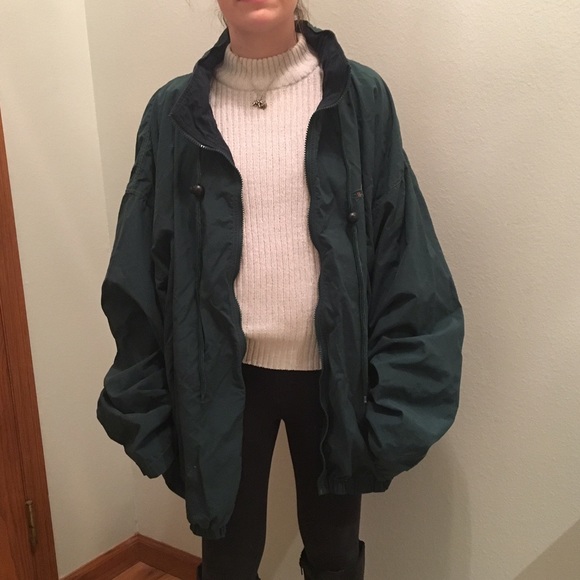 dark green windbreaker