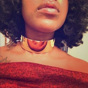 Bold, gold choker.