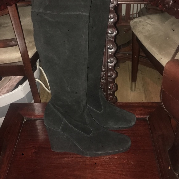 Talk black suede wedge boots.
