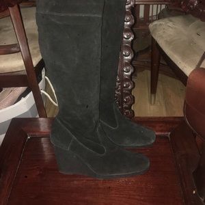 Talk black suede wedge boots.