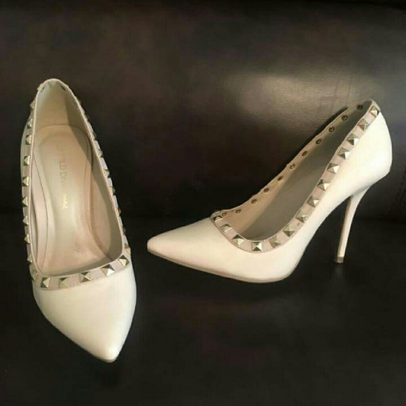 White pumps with studs