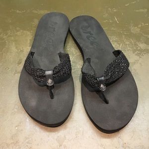 Never worn Black Reef flip flops