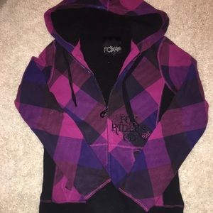 Fox fur lined zip up jacket with a hood