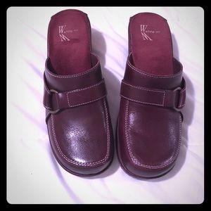 Very Nice leather Clogs. The color is Maroon.