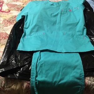 Gently used Med Couture Scrub set.