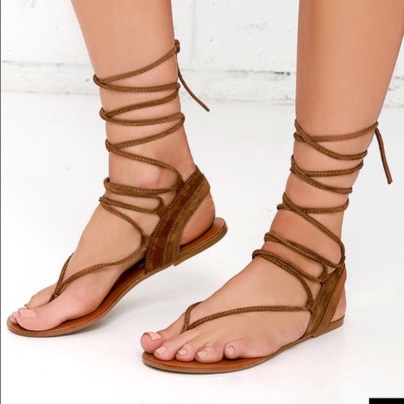 Brown lace-up sandals