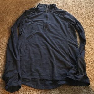 Grey half zip up running top.