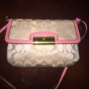 Coach pink trimmed crossbody bag