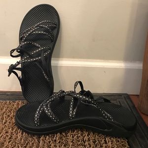 Grey and White Chacos.