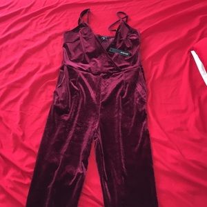 NEW!!! Velvet Jumpsuit. NEVER WORN. Size medium!