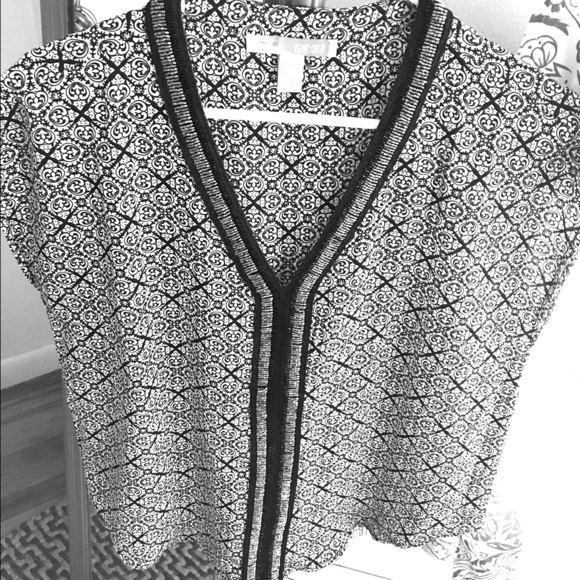 Bead embellished flowy top.
