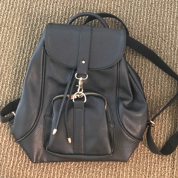 Black leather backpack w/ gold clasp