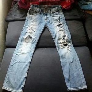Light wash slim straight destroyed jeans