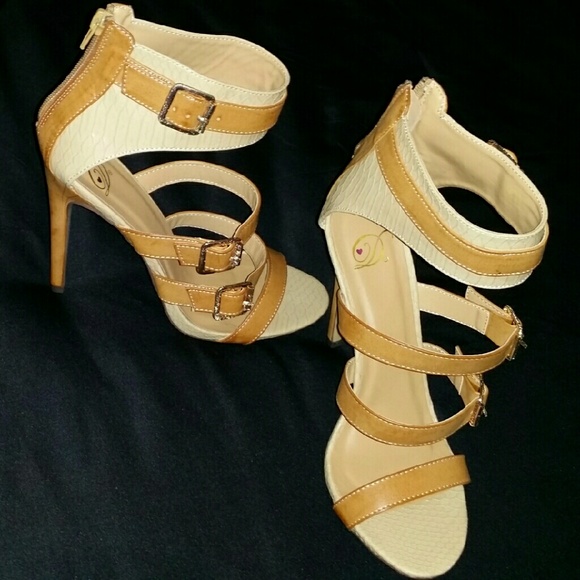 Tan and brown heels. Never worn