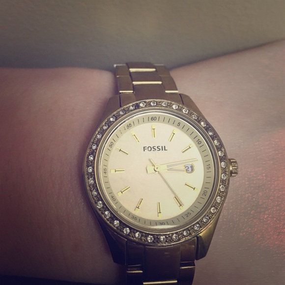 Women's gold fossil watch
