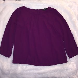 Purple long sleeved shirt