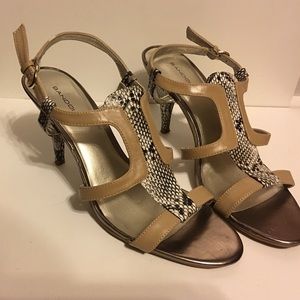 Comfortable Bandolino tan and snake print shoes