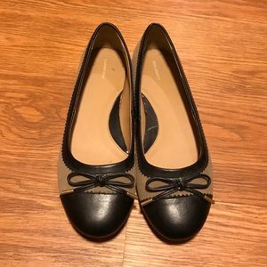 Brand new tan and black bow flats!