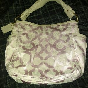 Pre-loved light pink and tan coach handbag
