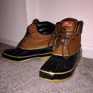 tan and black duck boots