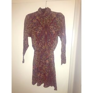Unique design shirt/mini dress. Fits like S.