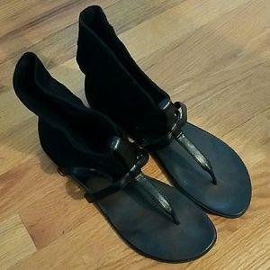 Size 10 black gladiator sandals.