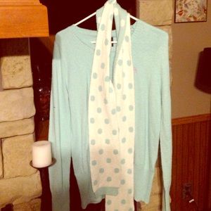 Sweater with reversible scarf