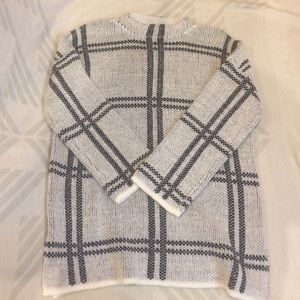 Never been worn plaid sweater.